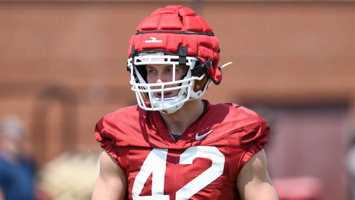 Alabama Crimson Tide transfer Drew Sanders listens to defensive coaches in practice while gearing up for the Razorbacks' season opener against Cincinnati in Fayetteville.
